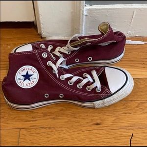 Maroon high top Converse.